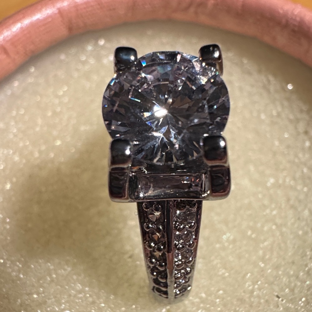 Dazzling 14k WG plated Silver Ring with Crystal Accent the size can be adjusted.